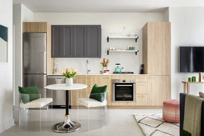 Modern kitchens including Bosch appliances, refined subway tile backsplash, quartz kitchen counter-tops, stainless steel shelving and stainless steel single bowl sink.