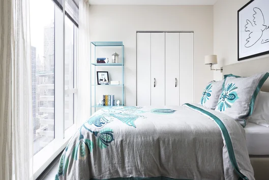 Custom-designed wide-plank wood flooring throughout residences