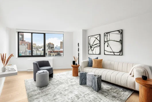 The unit is flooded with light with features oversized windows, generous layouts, abundance of closet space.