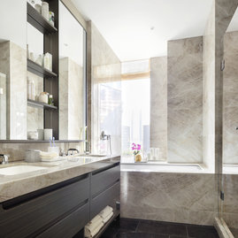 Bathrooms beautifully blend luxury with ease and simplicity.