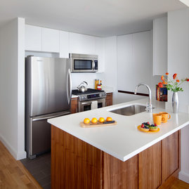 Gourmet kitchens feature stainless steel appliances. 