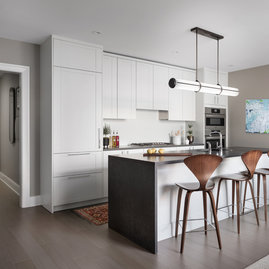 Kitchens feature Subzero built-in refrigerator, bottom mount freezer, Bosch Benchmark appliances including electric oven, gas cooktop, integrated dishwasher and microwave drawer.