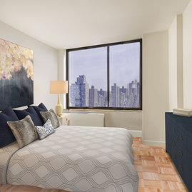 Bedrooms showcase high ceilings and every apartment features a washer-dryer.