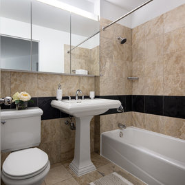 Bathrooms feature luxury finishes.