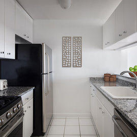 The gourmet kitchens at Tribeca Park include GE appliances and granite countertops.