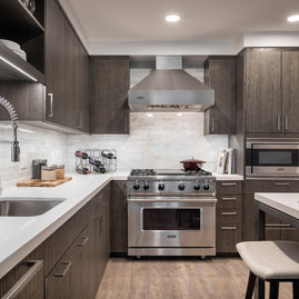 Townhome Kitchens include a suite of premium Viking appliances including a stainless steel gas range, refrigerator and dishwasher with integrated paneling and built-in microwave.