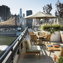 Take in the view from a lounge chair on the building's landscaped rooftop sun terrace.