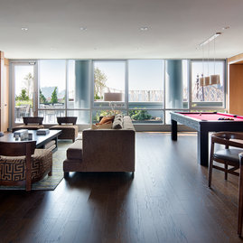 Our rooftop lounge features a private terrace, BBQ grills, and electrifying views of the Manhattan skyline.