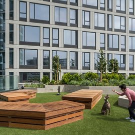 Private 5,600-square-foot landscaped rooftop dog park.