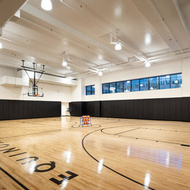 On-site full regulation basketball court.