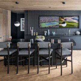 Multiple big-screen monitors make the Sports Lounge an ideal venue for viewing everything from the Oscars to the Super Bowl, and also features a custom-designed pool table and a bar with a Kegerator. 