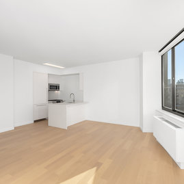 The unit is flooded with light as it features oversized windows and generous layouts.