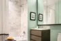 Master bathrooms feature Brazilian quartzite vanities and walls, St. Laurent marble floors and custom cabinetry.