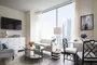 Custom-designed wide-plank wood flooring throughout residences