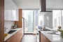 Gourmet kitchens with Snaidero duotone cabinetry and quartz countertops