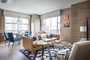 Interiors by renowned designer Clodaugh incorporate organic shapes and nature-inspired colors.