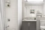 The Arlington's luxurious baths feature Italian marble floors, custom wood cabinetry, and oversized custom-designed medicine cabinets.