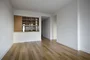 Open living and dining areas.