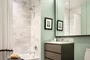 Master bathrooms feature Brazilian quartzite vanities and walls, St. Laurent marble floors and custom cabinetry.