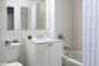 Bathrooms feature luxury finishes.
