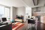 Floor to ceiling windows with sweeping city views