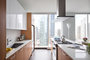 Gourmet kitchens with Snaidero duotone cabinetry and quartz countertops