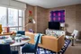Enjoy sweeping views of the High Line, the Empire State Building, Tribeca, and the Hudson River through floor-to-ceiling windows.