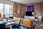 Enjoy sweeping views of the High Line, the Empire State Building, Tribeca, and the Hudson River through floor-to-ceiling windows.