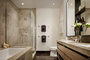 Master bathrooms feature Brazilian quartzite vanities and walls, St. Laurent marble floors and custom cabinetry.