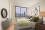 Bedrooms showcase high ceilings and every apartment features a washer-dryer.