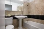 Bathrooms feature luxury finishes.
