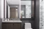 Luxe bathrooms include grey-oak vanities with marble counters and custom medicine cabinets.