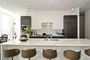 Gourmet kitchens with Snaidero duotone cabinetry and quartz countertops
