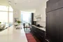 Gourmet kitchens with Snaidero duotone cabinetry and quartz countertops