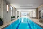 60 ft. indoor pool with access to an outdoor terrace overlooking Bennett Park.