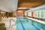 A heated swimming pool flooded with natural light, adjacent to a state-of-the-art health and fitness center, will inspire you to meet your fitness goals.