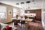 Relax and socialize with friends in an intimate club setting with a large screen TV, open kitchen and lots of comfy chairs.