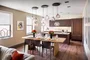 Relax and socialize with friends in an intimate club setting with a large screen TV, open kitchen and lots of comfy chairs.