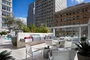 Take in breathtaking sunsets and city views from the rooftop BBQ terrace.