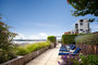 Perfectly planned landscaping on the rooftop terrace offers the ideal location to take in sweeping views of the Hudson River.