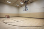 The half basketball court offers a regulation-height basketball goal.