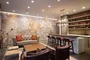 Socialize in a stunning lounge featuring lots of natural light, a large screen TV, open kitchen, sofas and tables for dining, conversation and games. The lounge is adjacent to the dining terrace.