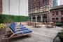 This lushly landscaped sun terrace complete with lounge chairs, tables and chairs provides the perfect setting to relax, refresh and recharge while enjoying views of the city.