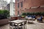 This lushly landscaped sun terrace complete with lounge chairs, tables and chairs provides the perfect setting to relax, refresh and recharge while enjoying views of the city.