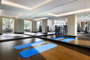 A private yoga studio, adjacent to the fitness center, is available to residents.