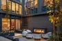 Landscaped courtyard with lounge area and fireplace