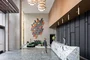 The light-filled double-height lobby with 24/7 concierge and thoughtfully curated art and design establishes a welcoming atmosphere the moment you arrive. 