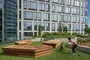 Private 5,600-square-foot landscaped rooftop dog park.