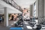 State-of-the-art fitness center with cardiovascular machines and Tonal’s strength-training system