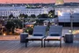 Landscaped rooftop with gunite swimming pool, two hot tubs, and resort-style sun terrace.